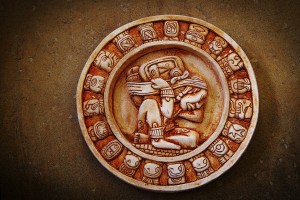 A carved Mayan calendar on textured background. Despite the provisional nature of calendars, two real phenomena govern almost all of them: the phases of the moon and the rotations of the sun. PHOTO: ISTOCK