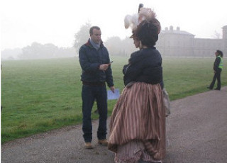 The Director, Saul Dibb, talking to Bess, Hailey Atwell