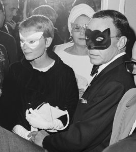 Frank Sinatra and his wife, actress Mia Farrow, as they arrive at Truman Capote's Black and White Ball.
